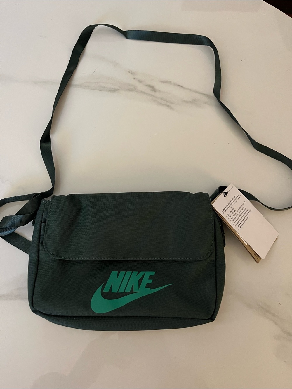 Nike hunter green bag with Swoosh Accent